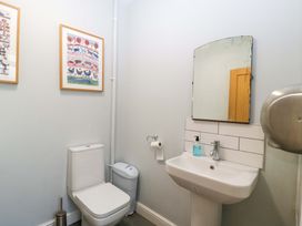 A bathroom with a sink and toilet at The Swan in 