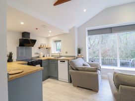 A kitchen with appliances and seating at Lodge at Nadur