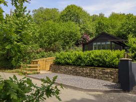 A house with garden and gate at Lodge at Nadur Commins Coch near Machynlleth