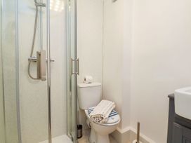 A bathroom with a shower and toilet at Sunnyvale House in Whitby