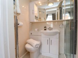 A bathroom with a shower and sink at Sunnyvale House in Whitby