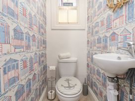 A bathroom with a toilet and hand basin at Sunnyvale House in Whitby