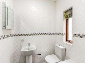 A bathroom with sink and toilet at Skiddaw in Penrith
