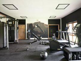 A gym with exercise equipment at Caldew Cottage Spa Penrith