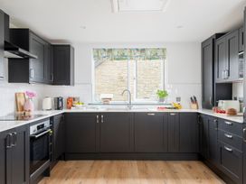 A kitchen featuring cabinets, a sink, and countertop at Patterdale (Pet) Penrith