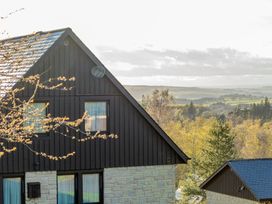A view of a house with windows and trees at The Hexham in Slaley