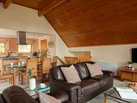 A living room with a kitchen and dining area at The Hexham (Pet) in Slaley