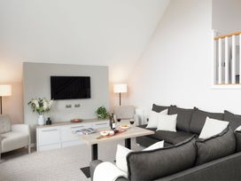 A living room with a sofa and coffee table at The Hexham Spa in Slaley