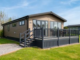 A house with a deck and steps at Greystone in Great Ayton