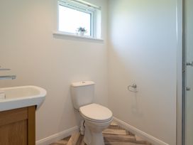 A bathroom with a toilet and sink at Greystone in Great Ayton