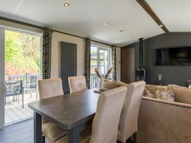 A dining room with a table and chairs at The Woods in Great Ayton