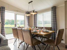 A dining room with a table and chairs at Roseberry in Great Ayton