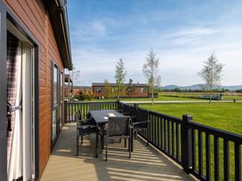 An outdoor area with a table and chairs at Roseberry (Pet) Great Ayton