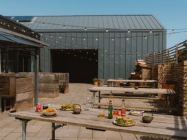 An outdoor dining area with tables and food at The Grays in North Berwick