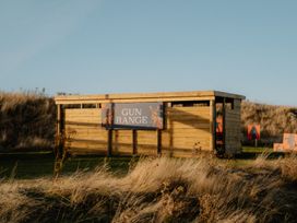A gun range with wooden structure and targets at The Grays in North Berwick