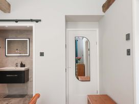 A bathroom with a sink and mirror at The Homestead in Moorsholm