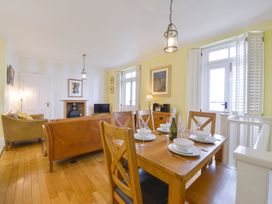 A dining room with a table and chairs at The Old Signal House in Torpoint