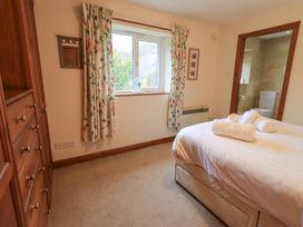 A bedroom with a bed and a window at Thrang View in Chapel Stile