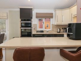 A kitchen with a window and countertop at High Lake View Lodge near White Cross Bay