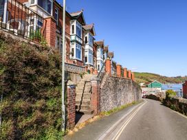 A street view with houses and steps at 43 Sandquay Road Dartmouth