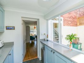 A kitchen with a counter and doorway at 43 Sandquay Road in Dartmouth