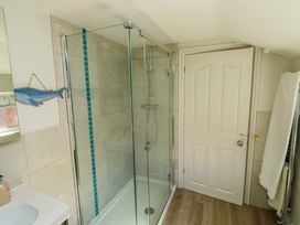 A bathroom with a shower and sink at 43 Sandquay Road, Dartmouth