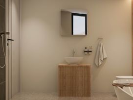 A bathroom with a sink and shower at Kew Villa (Pet) Marhamchurch