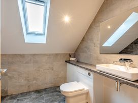 A bathroom with a sink and toilet at Tranquillity 4 in Carnforth