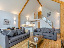 A living room with a sofa and coffee table at Tranquillity 4 (Pet) in Carnforth