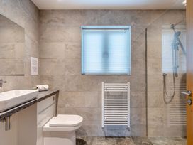 A bathroom with a sink and shower at Tranquillity 4 (Pet) in Carnforth