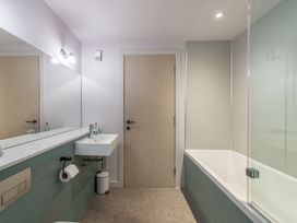 A bathroom with a sink and bathtub at The Telfer in North Berwick