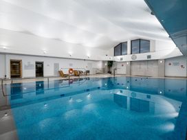 An indoor pool area with sauna and steam room at The Telfer in North Berwick