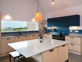 A kitchen with a sink and stove at The Irvine in North Berwick