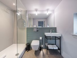 A bathroom with shower, toilet, and sink at The Irvine in North Berwick