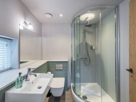 A bathroom with a shower, sink, and toilet at The Irvine in North Berwick