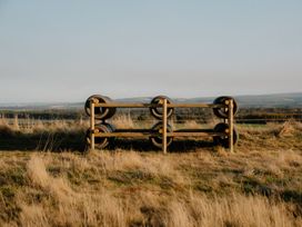 A wooden structure with tires at The Irvine in North Berwick