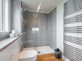 A bathroom with a shower and toilet at The Townsend in North Berwick