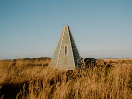 A house surrounded by grass at The Laidlaw in North Berwick