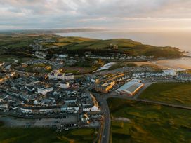 An aerial view of a coastal town and surrounding landscape at Kynance (Pet) Bude