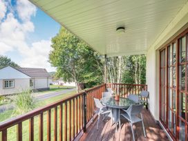 A balcony with a table and chairs at Brunston in Dailly
