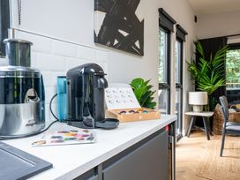 A kitchen with a juicer and coffee machine at Cabin 3.0 (Pet) Dumfries