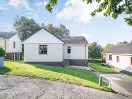 A house with garden and pathway at Ailsa Craig Spa, Dailly