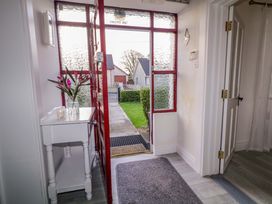 An entryway with a console table and a plant at San Antonio, Dungloe, County Donegal