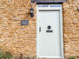 An entrance door with a sign at The Old Bakery in Banbury