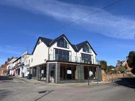 A building with a balcony and large windows at 2B Hamilton Road in Felixstowe