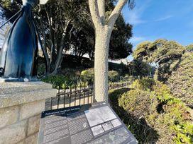 An information board and greenery at Felixstowe Seafront Gardens in Felixstowe