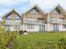 A house with balconies and glass doors at Praa Waves in Penzance