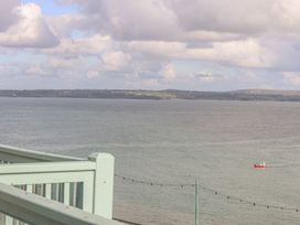 A view of water with a boat at Harbour Lights in Penzance