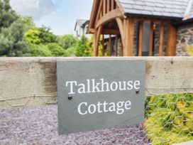 A sign with the text Talkhouse Cottage at The Talkhouse Cottage in Caersws