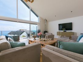 A living room with a sofa and a coffee table at 2 Remera in St Ives